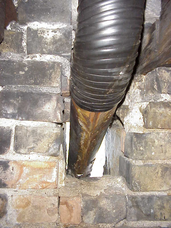 BALLROOM_ATTIC_SPOUT_#6-(from_north)_BEFORE_GUTTER