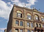 NORTH_FACADE_WITH_REPAIRED_WINDOW