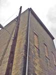 STAGE_HOUSE_NE_CORNER_DOWNSPOUT_ONE_BRICK_HOOK