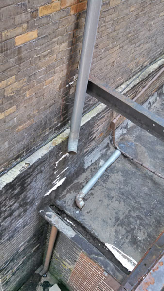 SPOUT_ABOVE_MENS_WC__KEN_POST_REPAIR_6-2013